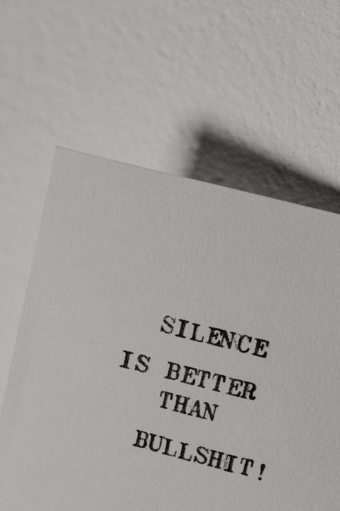 Inspirational Phrase About Silence on a White Paper